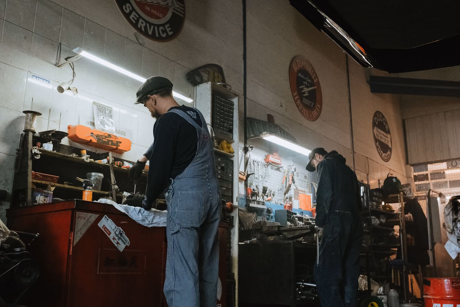 Two technicians at work in the shop